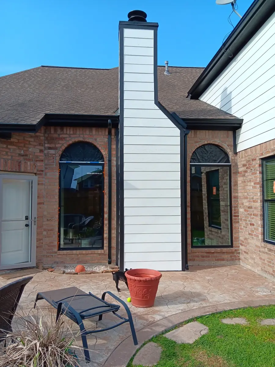 Front brick entry with gutter detail above the porch