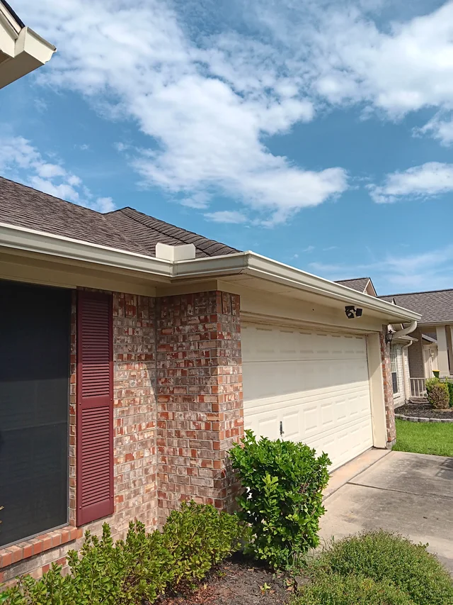 Gutter line above a residential garage entrance