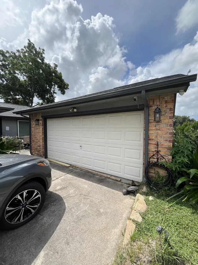 Gutter line above a residential garage entrance