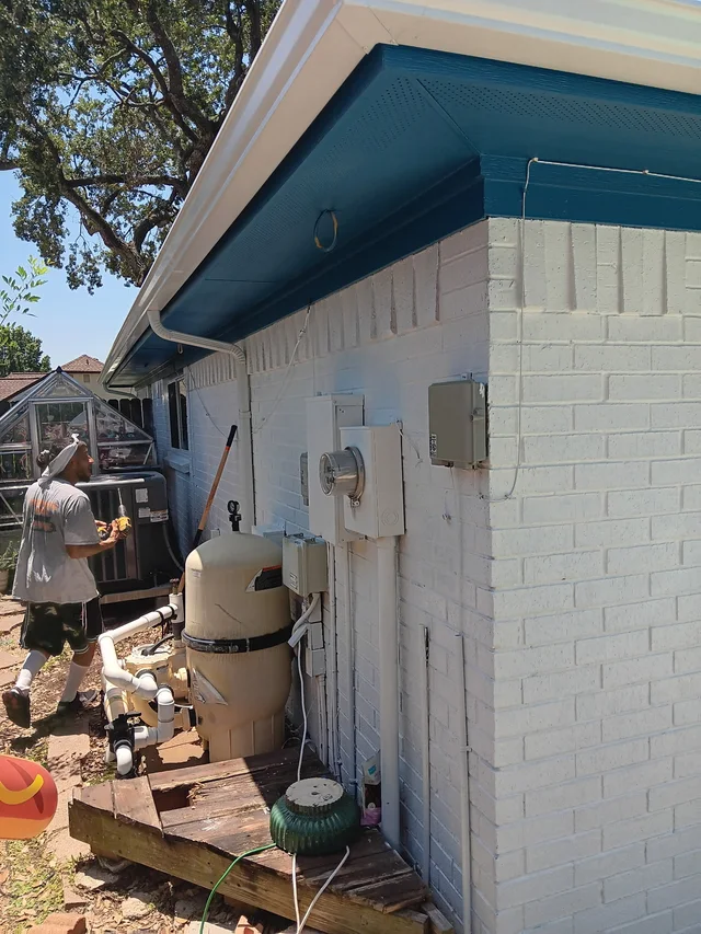 Gutter line beside exterior utility equipment