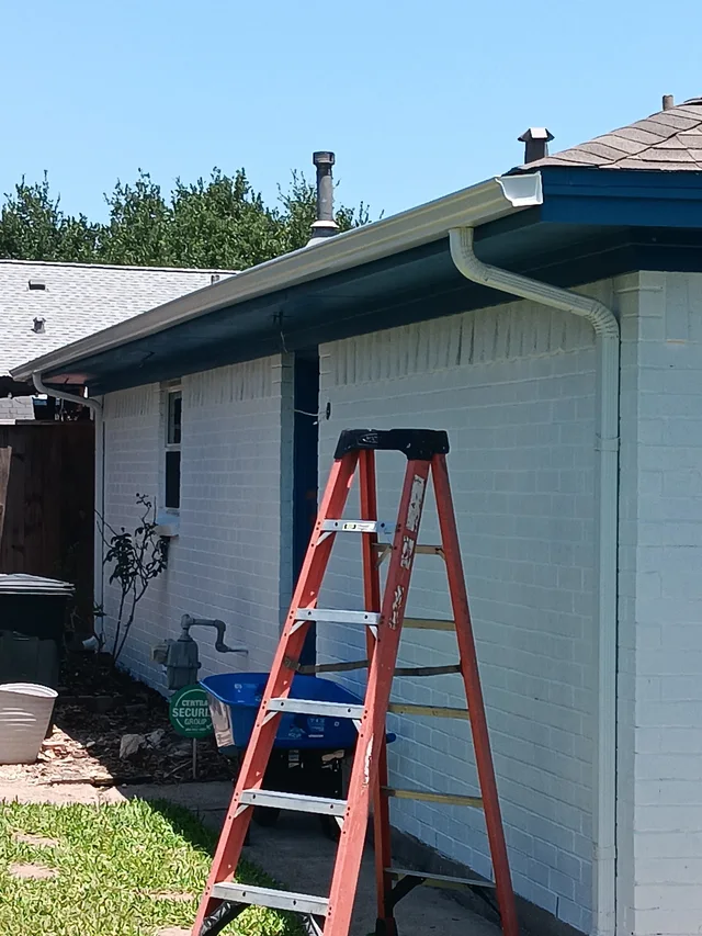 Gutter line above a residential garage entrance